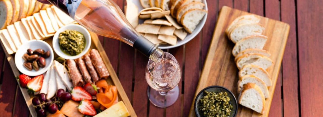 A bottle of Small Wonder wine being poured